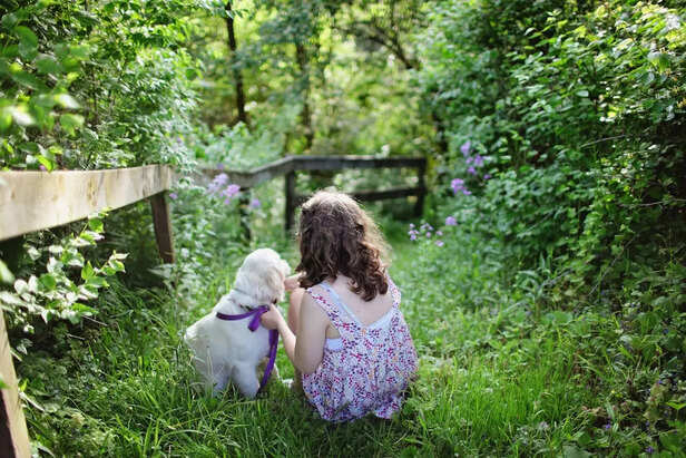 Girl and Puppy.