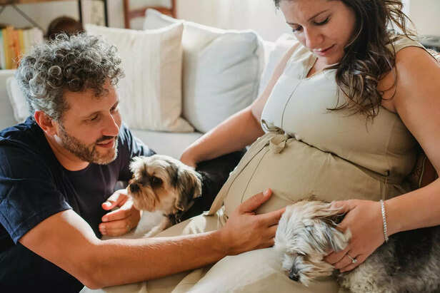 Dog owners with their pet